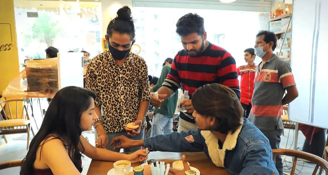 Redpoint crew shooting a scene in a café